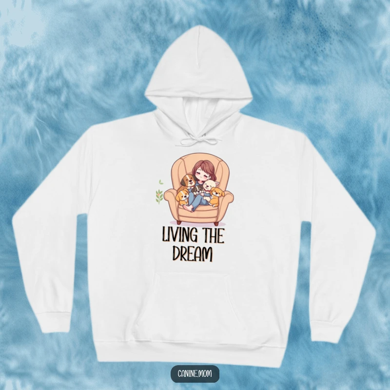 Funny Hoodie: Woman sitting in a cozy armchair, deeply snuggled and loved by a pile of happy dogs.