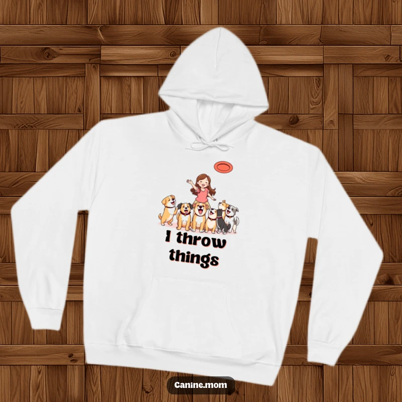 Funny Hoodie: Woman energetically throwing a frisbee, with a pack of happy dogs eagerly watching and ready to run.