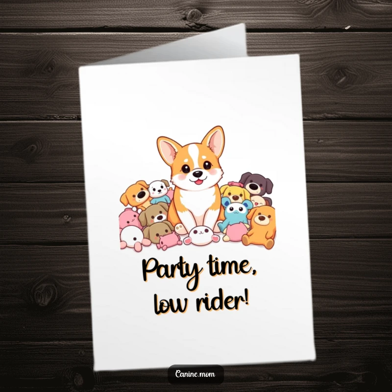 Funny Free Printable Birthday Card featuring a corgi joyfully sitting amidst a colorful pile of dog toys, ready to play.